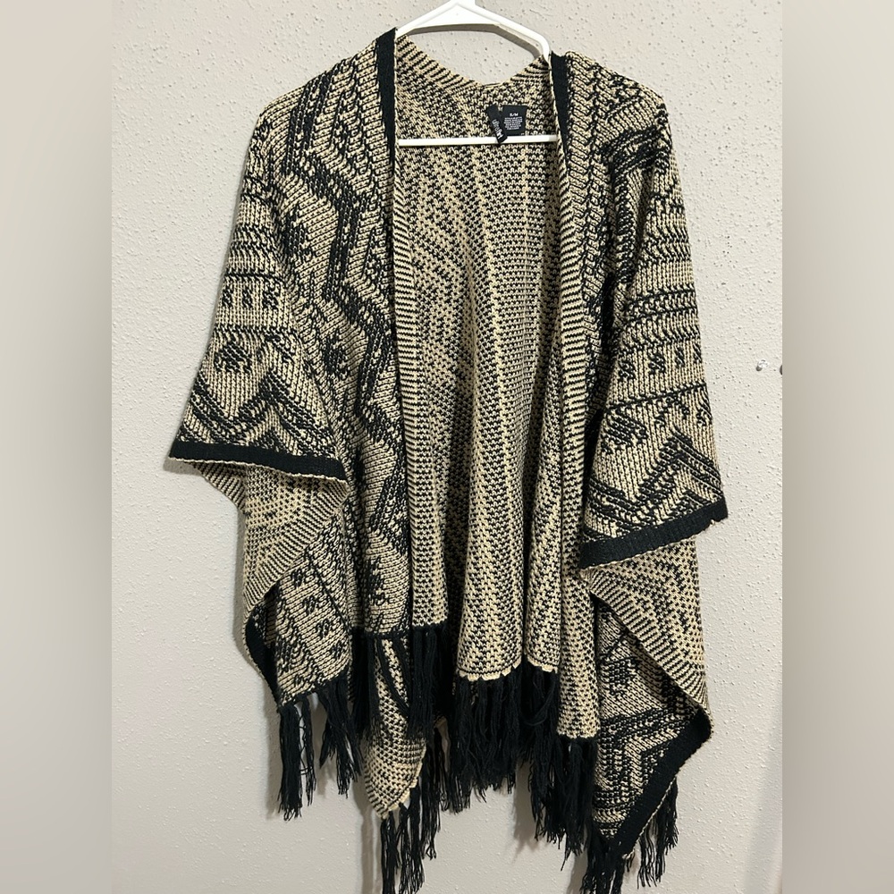 Ultra Flirt Black and Cream Patterned Knit Poncho.